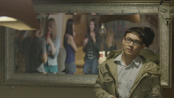 Ep. 1-Munkey watching Evet at party.jpg