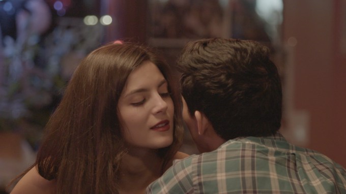 Ep. 6-Evet whispering in Munkey's ear.jpg