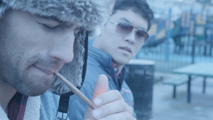 Ep. 6-Thompson lighting up blunt (CU, park)